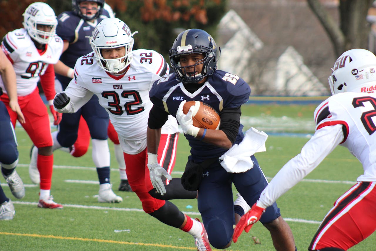 digital Dynamic college football match with players in action, showcasing athleticism and teamwork on the field.